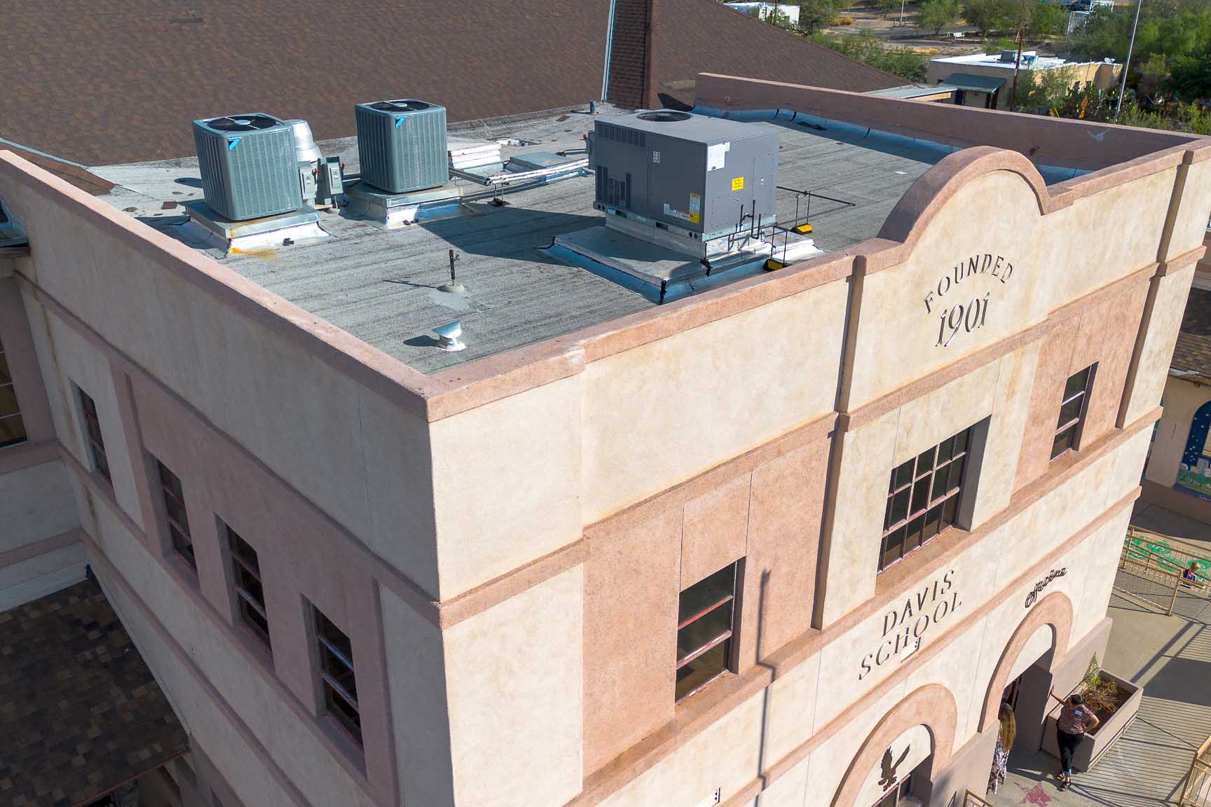 A closeup of the air conditioning units on top of Davis