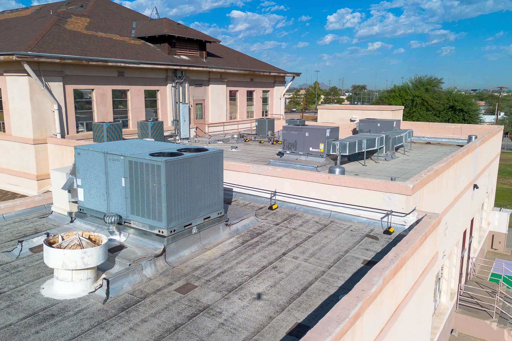 A closeup of the air conditioning units on top of Davis